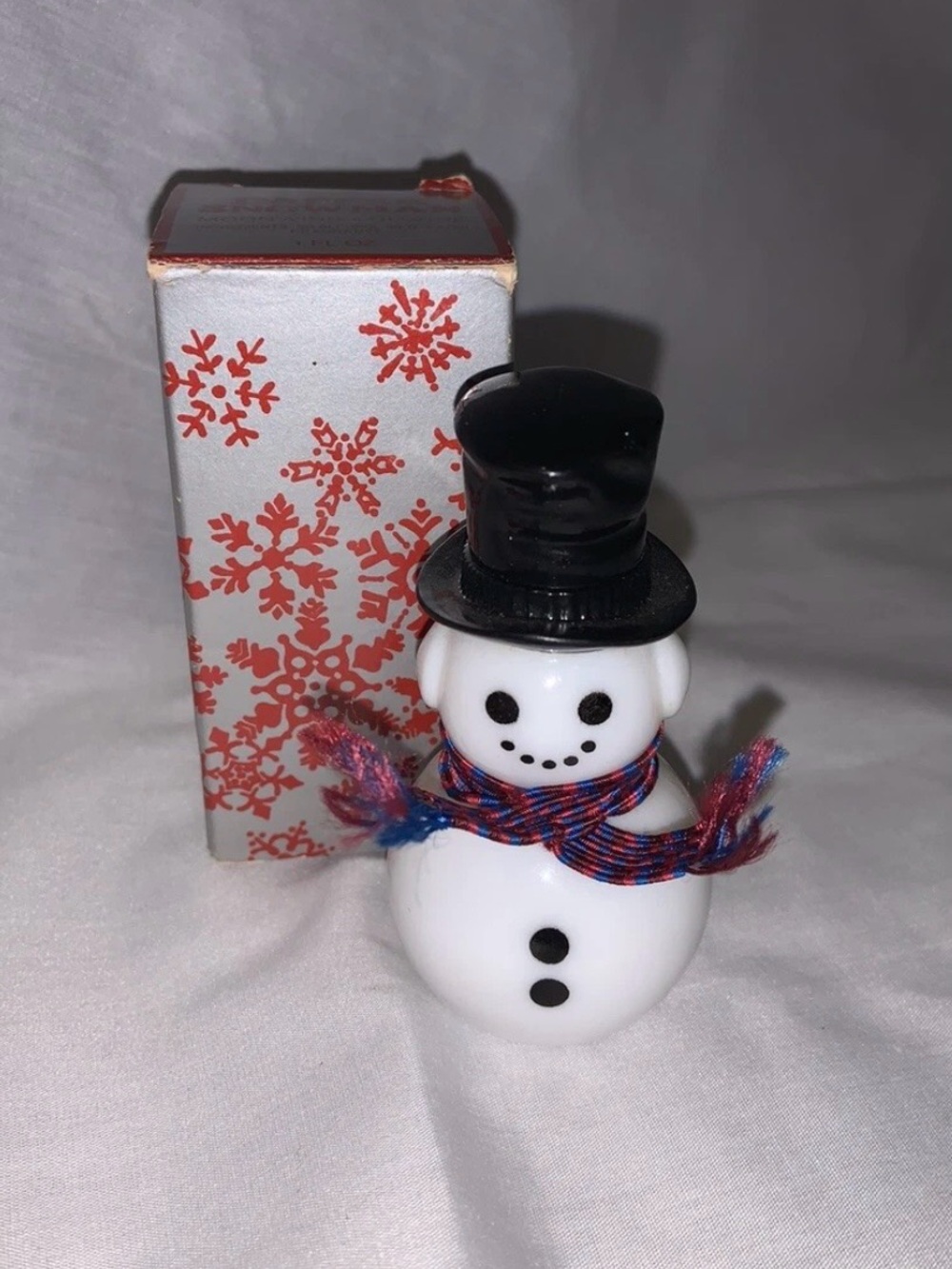 Festive White Snowman Figurine with Black Hat and Multicolor Scarf